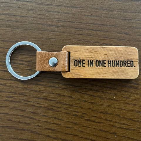 One in One Hundred Wooden Keychain